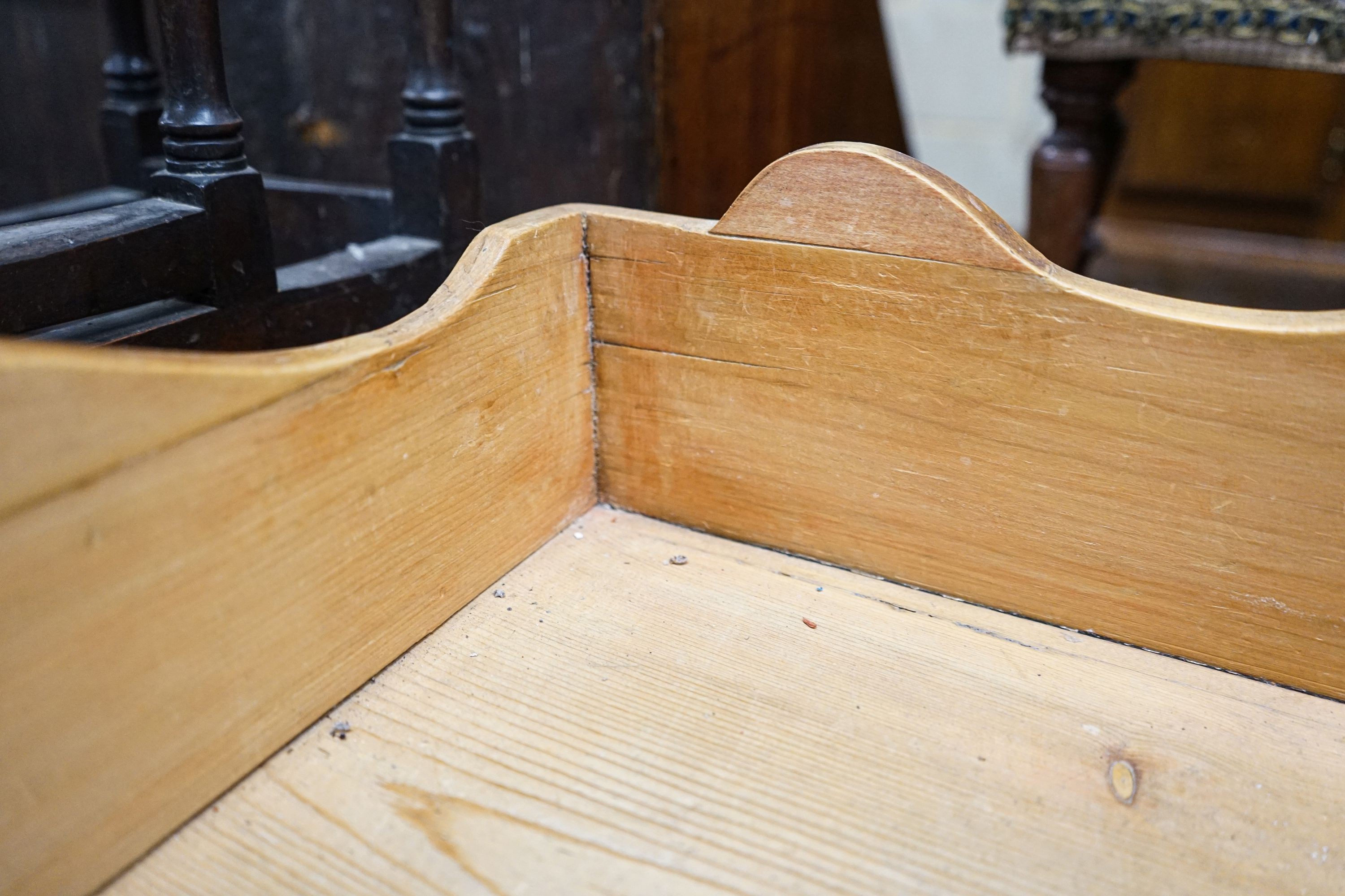 A Victorian pine chest, with three quarter gallery, four drawers and turned feet, width 96cm, depth 44cm, height 99cm